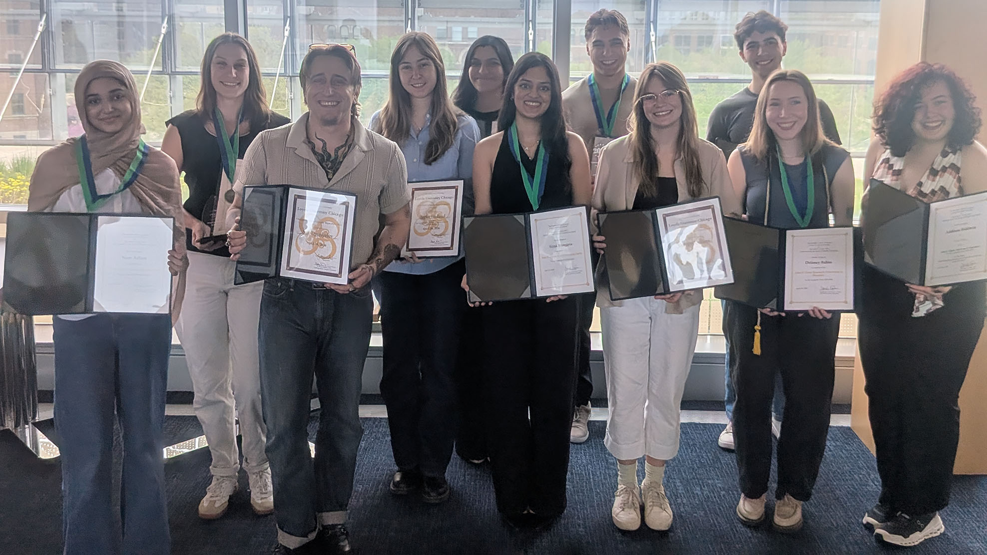 2026 Philosophy and Bioethics Undergraduate Award Winners pose with their certificates